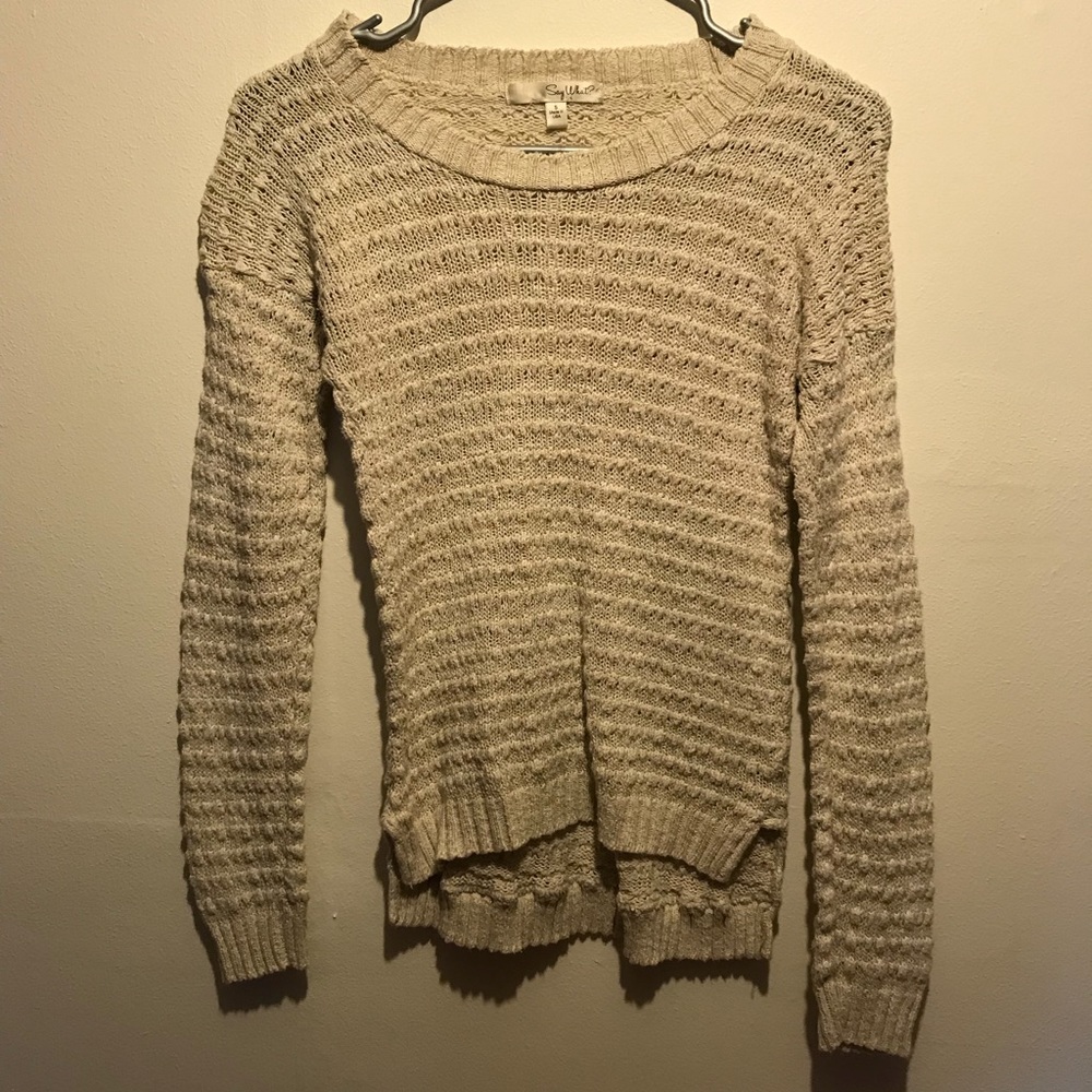 Say what? Cream knitted sweater